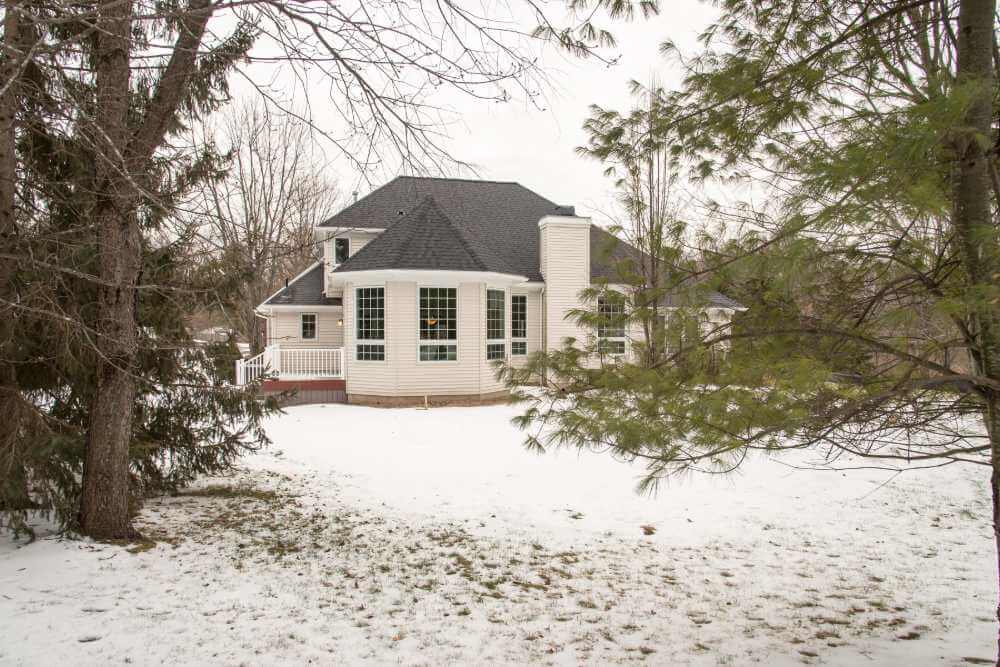 home addition exterior with new windows and siding by Odd Fellows Contracting in Okemos, MI