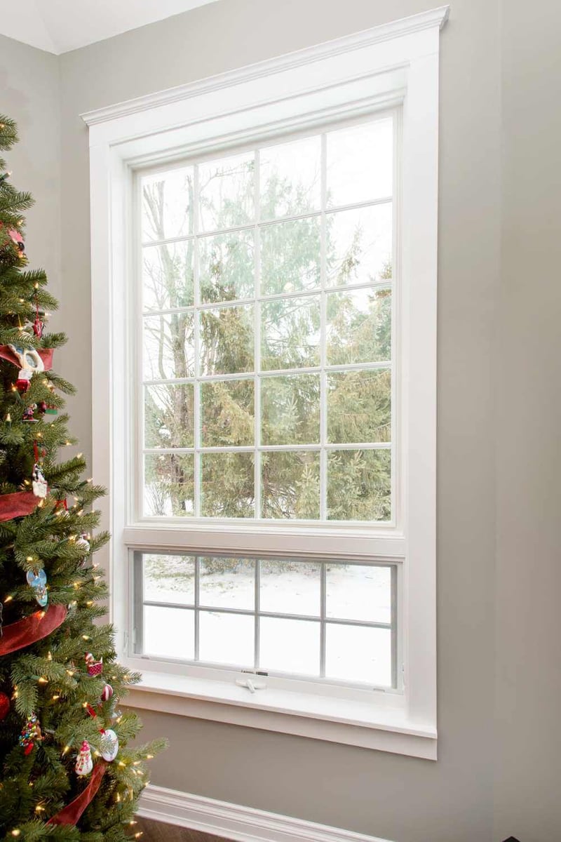 large double hung window in living room addition by Odd Fellows Contracting in Okemos, MI
