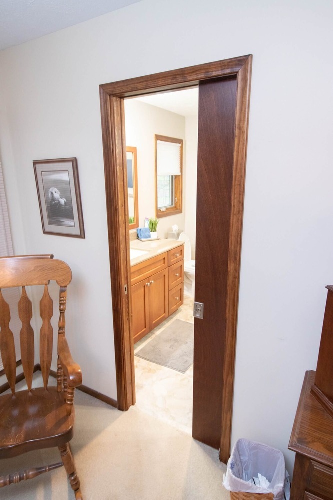 bathroom remodel featuring custom vanity desk and mirror by Odd Fellows Contracting in Okemos, MI