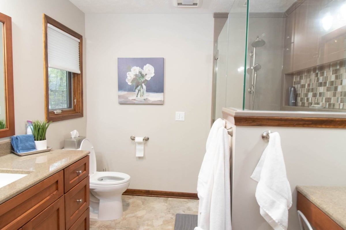 renovated bathroom interior with custom vanity by Odd Fellows Contracting in Okemos, MI