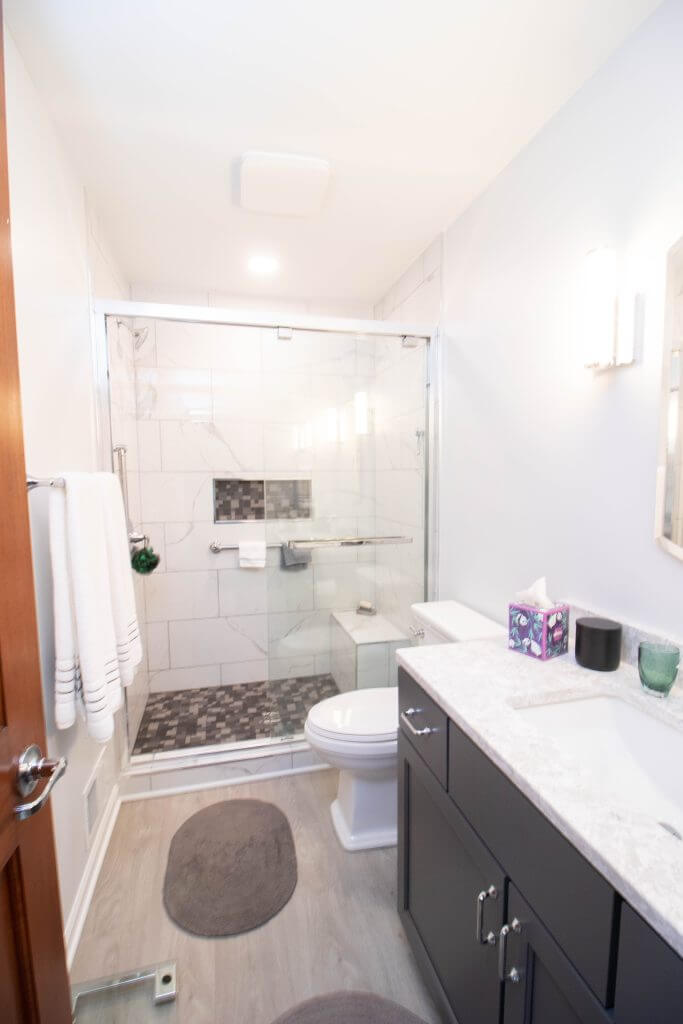 remodeled bathroom vanity and glass shower by Odd Fellows Contracting in East Lansing, MI