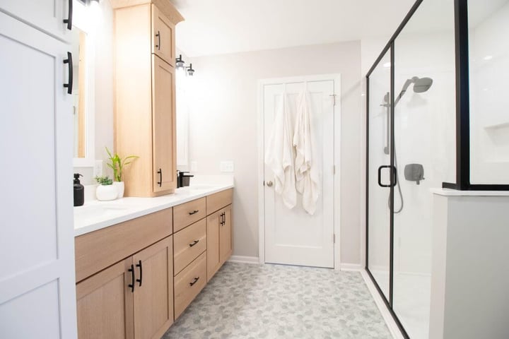 double vanity and walk-in shower layout in bathroom remodel by Odd Fellows Contracting in Okemos, MI