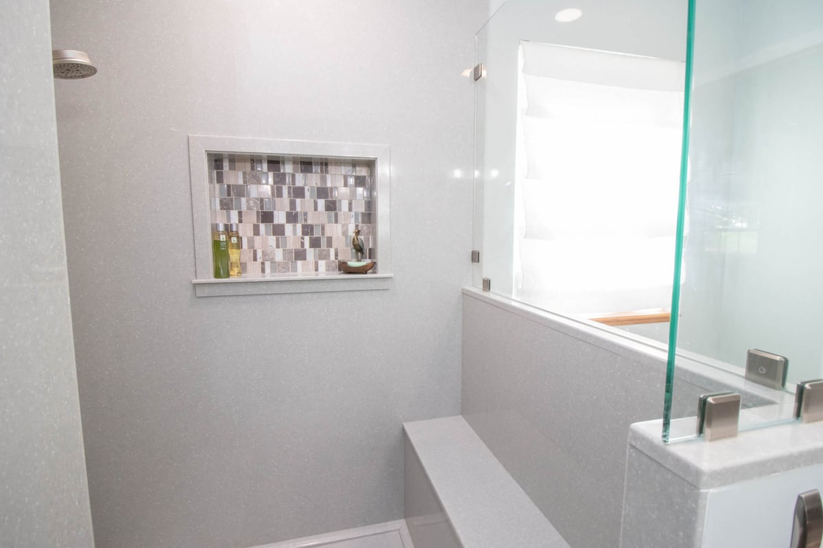modern bathroom shower remodel with glass enclosure by Odd Fellows Contracting in Laingsburg, MI