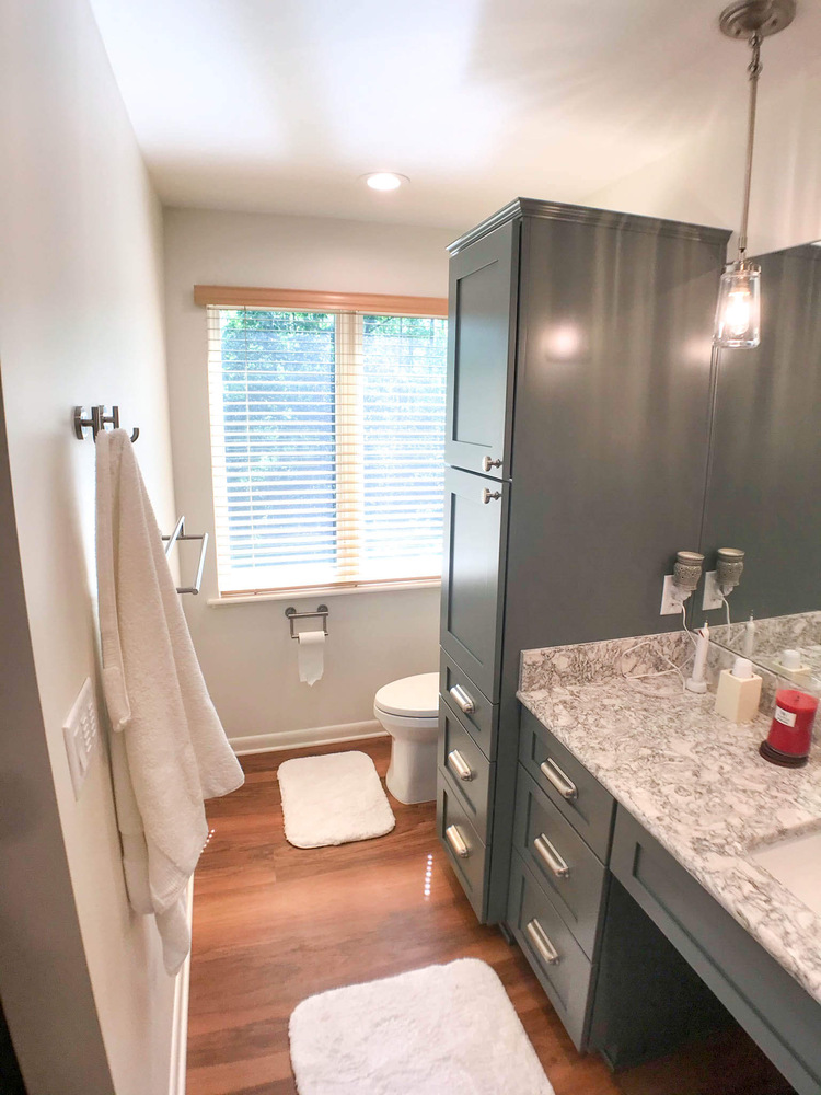 bathroom remodel by Odd Fellows Contracting in Owosso MI with custom vanity and toilet area