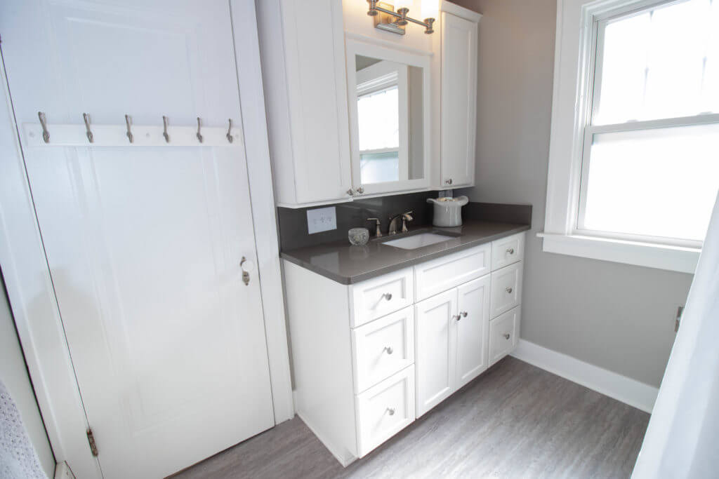bathroom addition by Odd Fellows Contracting in East Lansing MI with new cabinetry and flooring bathroom addition by Odd Fellows Contracting in East Lansing MI with new cabinetry and flooring
