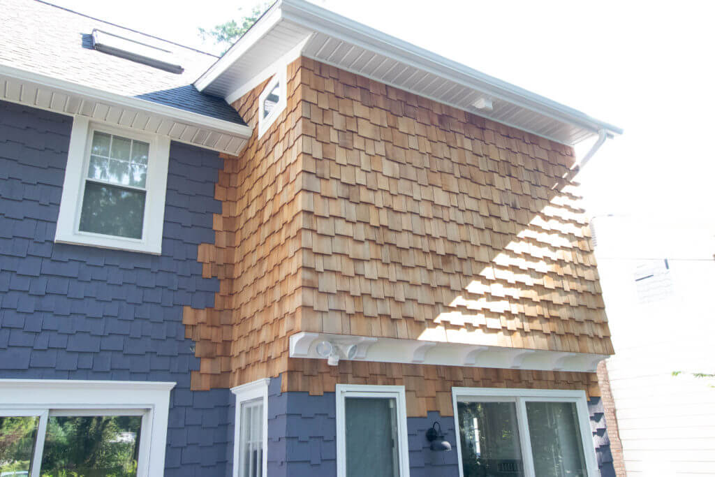 exterior home addition by Odd Fellows Contracting in East Lansing MI with new siding and roofing
