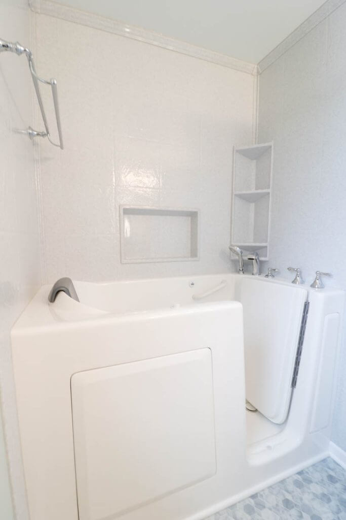 walk-in tub installation during bathroom remodel by Odd Fellows Contracting in Williamston, MI