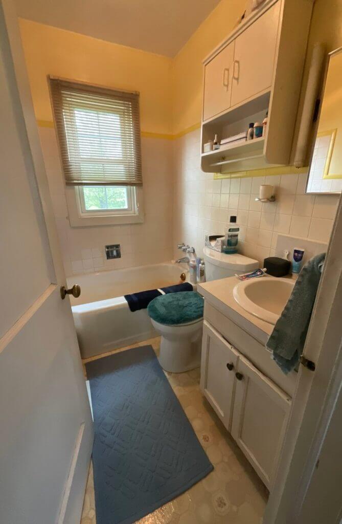 completed bathroom remodel by Odd Fellows Contracting in Mulliken, MI with bright shower surround and updated fixtures