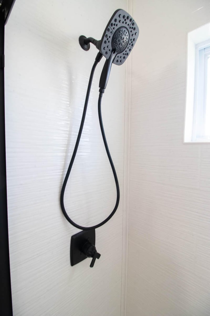 updated shower system installed by Odd Fellows Contracting during Holt, MI bathroom remodel