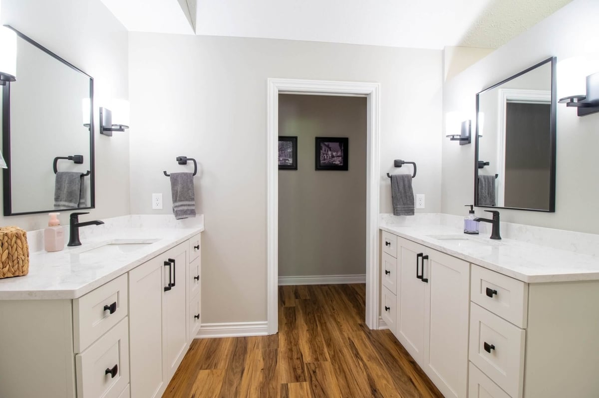 bathroom remodel by Odd Fellows Contracting in Portland, MI featuring symmetrical double vanity and mirrors