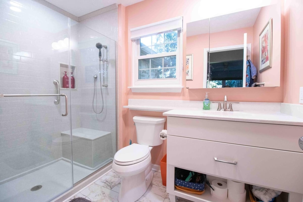 Bathroom remodel with glass walk-in shower by Odd Fellows Contracting in Williamston, MI