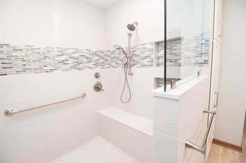 Barrier-free walk-in shower by Odd Fellows Contracting in Greater Lansing, MI showing 2027 bathroom design trends