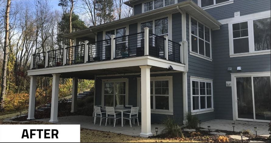 finished outdoor deck addition with modern railing by Odd Fellows Contracting in Lansing, MI