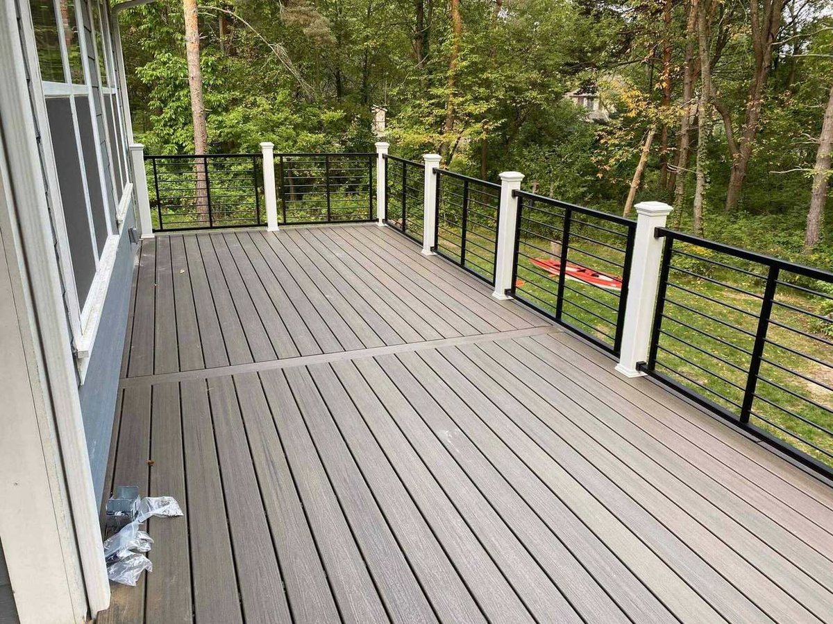 new elevated outdoor deck space installed during deck expansion by Odd Fellows Contracting in Lansing, MI