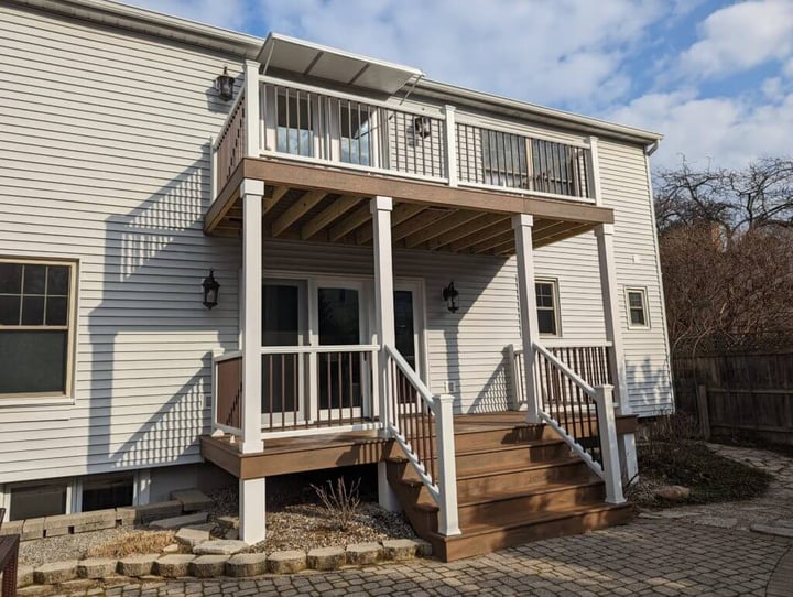 Two-level deck renovation in East Lansing MI with a covered lower patio by Odd Fellows Contracting Two-level deck renovation in East Lansing MI with a covered lower patio by Odd Fellows Contracting