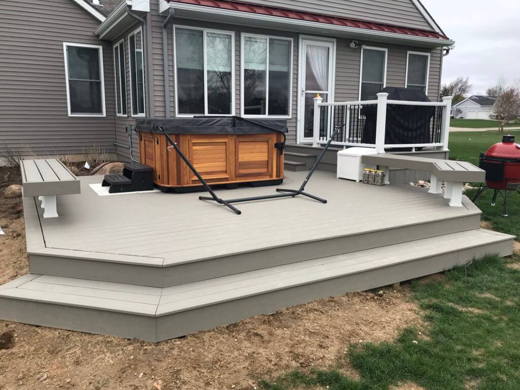 Backyard deck remodel with expanded entertaining space in Haslett Michigan
