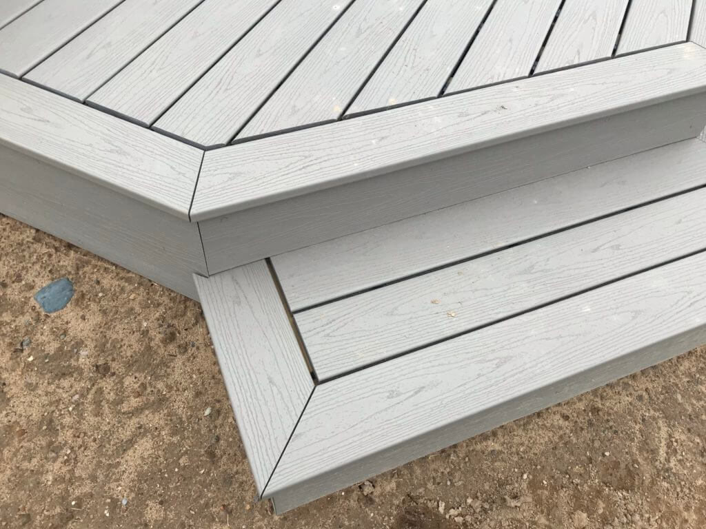 Precision deck framing and composite decking detail by Odd Fellows Contracting Haslett Michigan