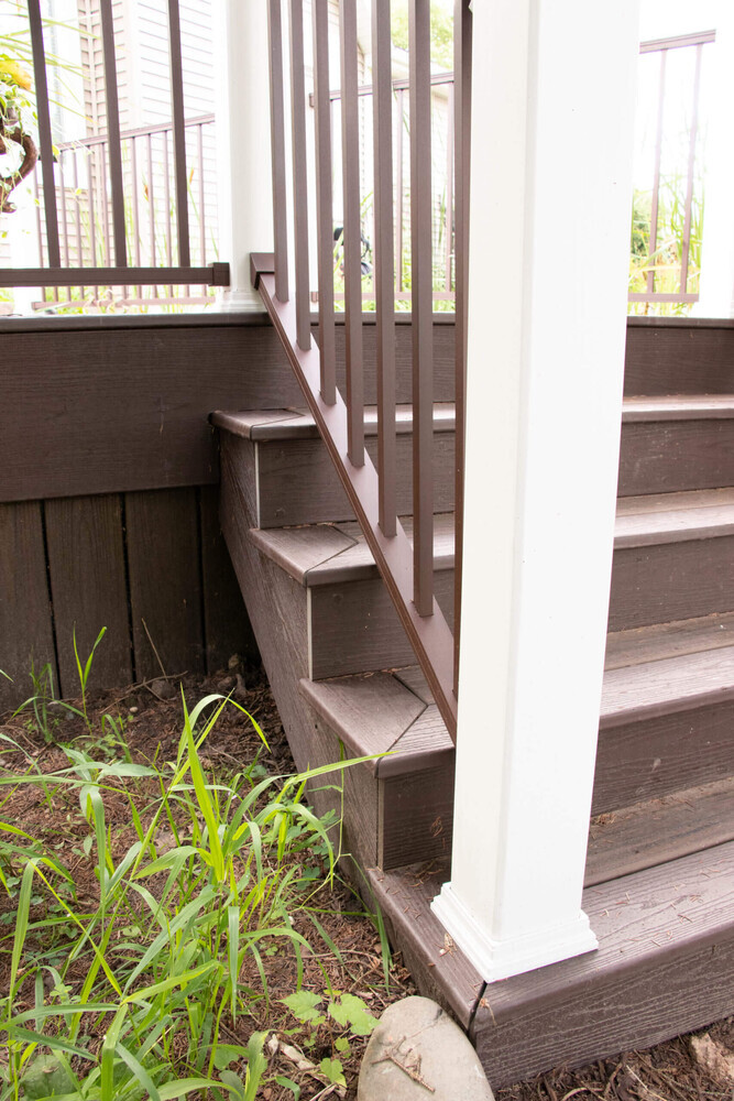 deck stairs and railing detail by Odd Fellows Contracting in Williamston MI with composite decking steps