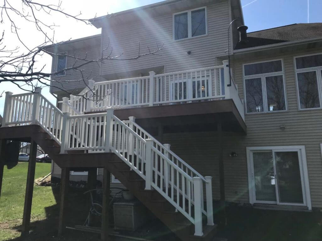 composite deck stairs and guardrail installation by Odd Fellows Contracting in Holt MI