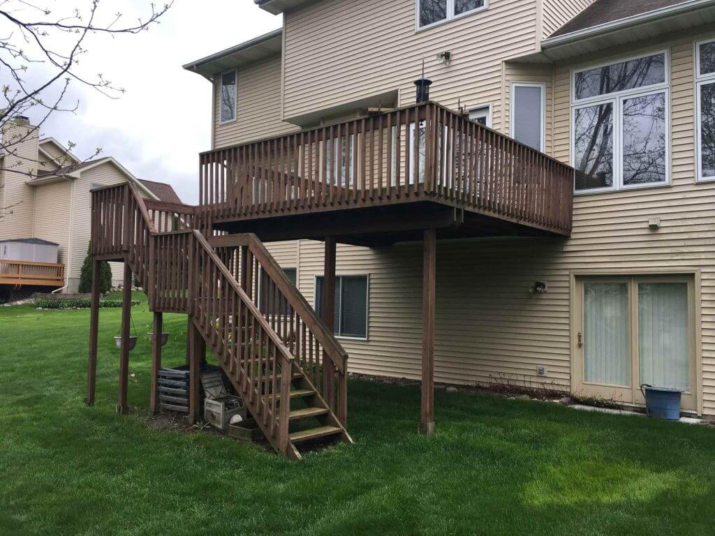 elevated wood deck before remodeling project by Odd Fellows Contracting in Holt MI