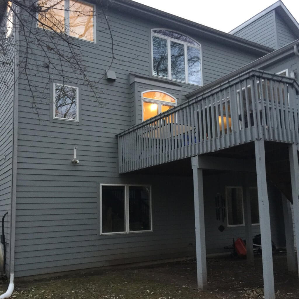 Old elevated backyard deck before renovation by Odd Fellows Contracting in Okemos Michigan