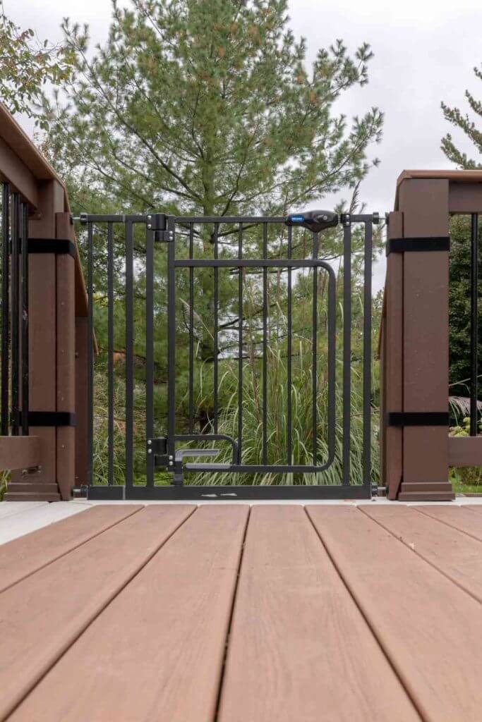 Composite deck railing detail installed by Odd Fellows Contracting in Lansing Michigan
