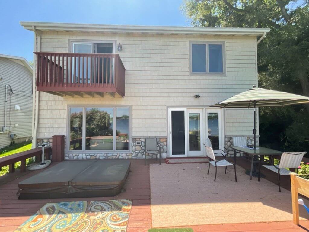 original backyard deck and patio before renovation by Odd Fellows Contracting in Haslett Lake MI