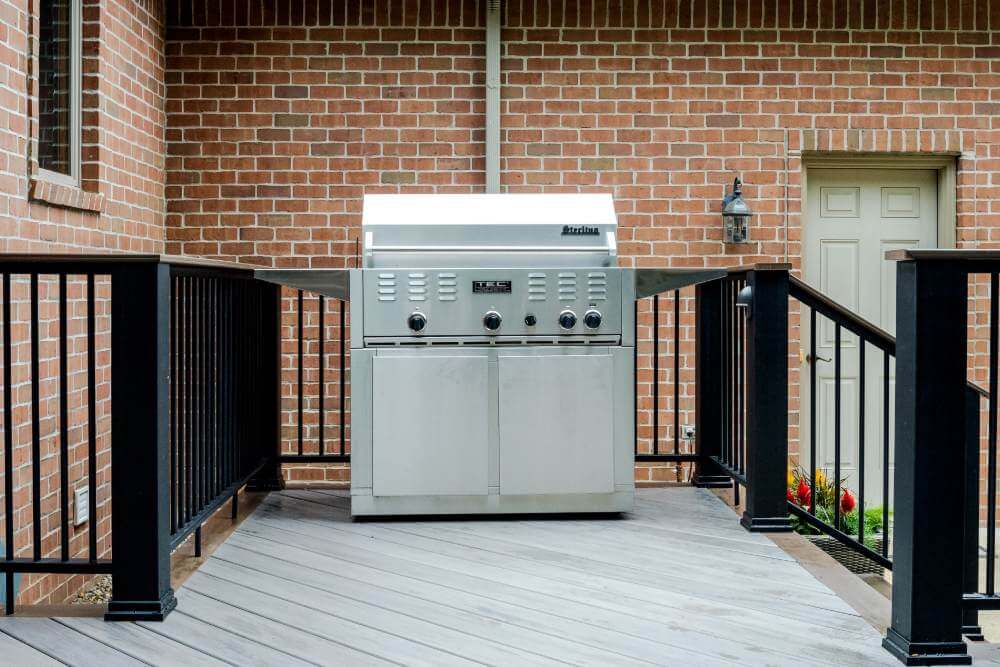 Outdoor grill station on composite deck in Williamston MI deck remodel by Odd Fellows Contracting
