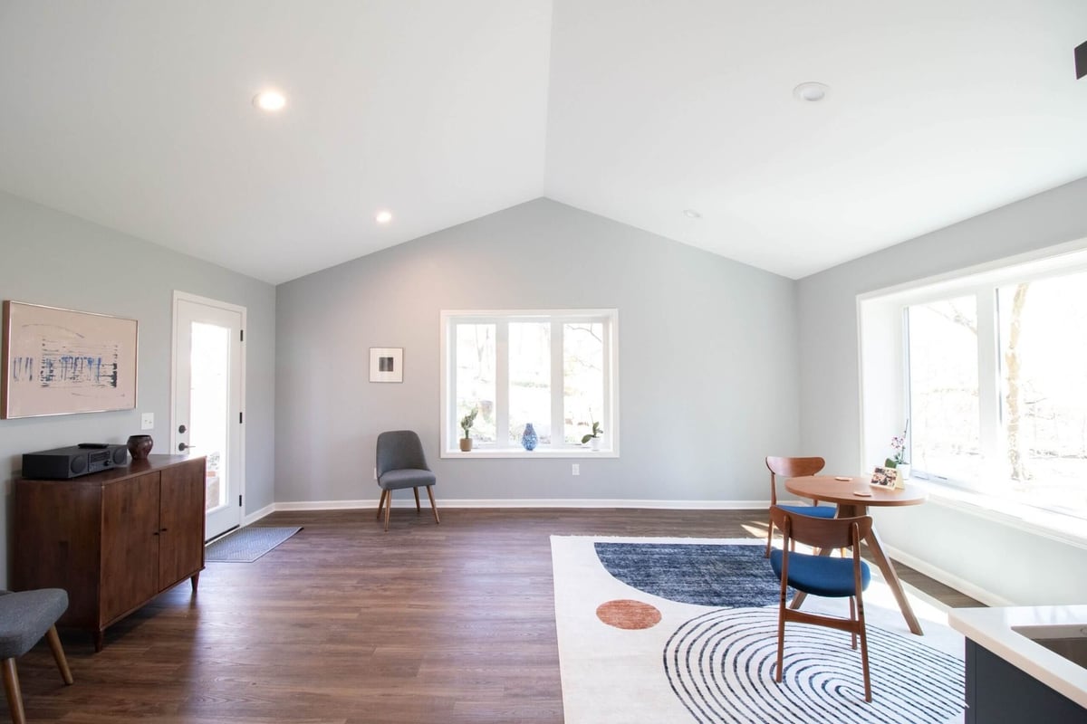 modern interior from garage conversion project by Odd Fellows Contracting in Okemos, MI