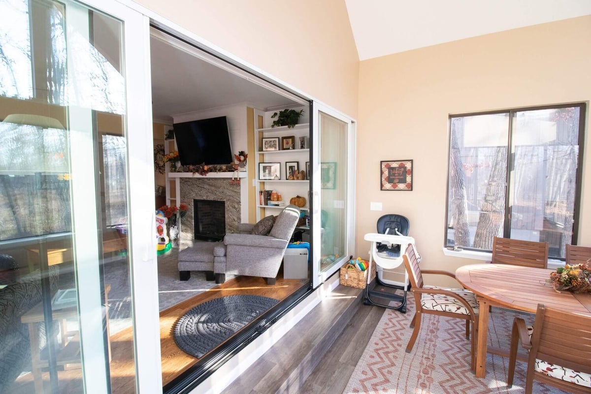 interior view of sunroom addition with sliding doors by Odd Fellows Contracting in Haslett MI