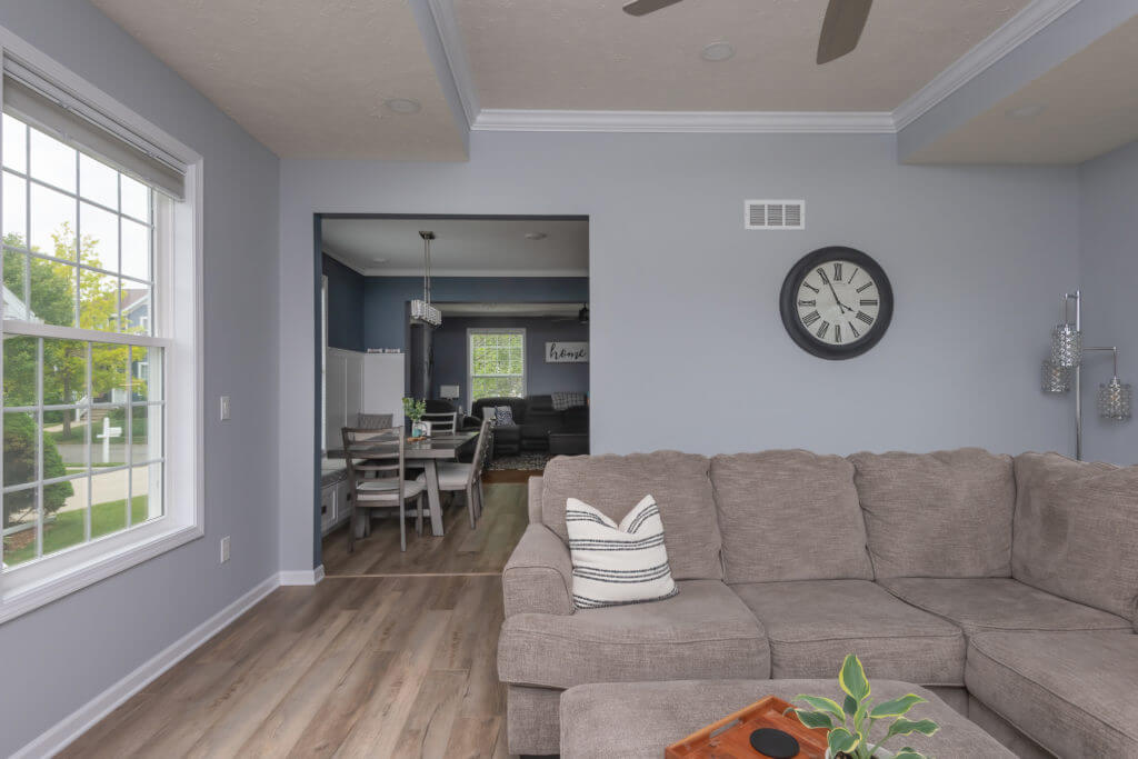 spacious living room addition with open entry to dining area by Odd Fellows Contracting in East Lansing MI