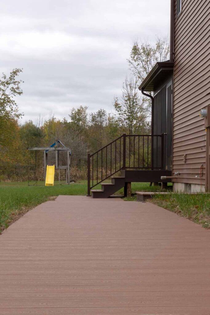 outdoor deck and steps leading to screened porch addition by Odd Fellows Contracting in Grand Ledge MI