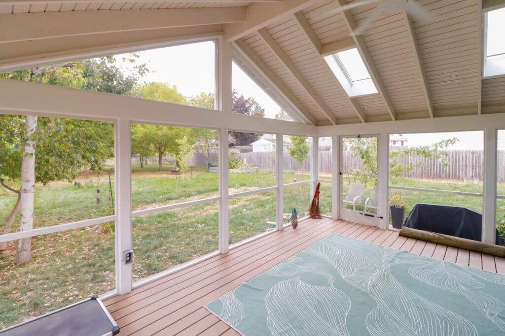 bright enclosed sunroom addition by Odd Fellows Contracting in Cataline Drive, MI