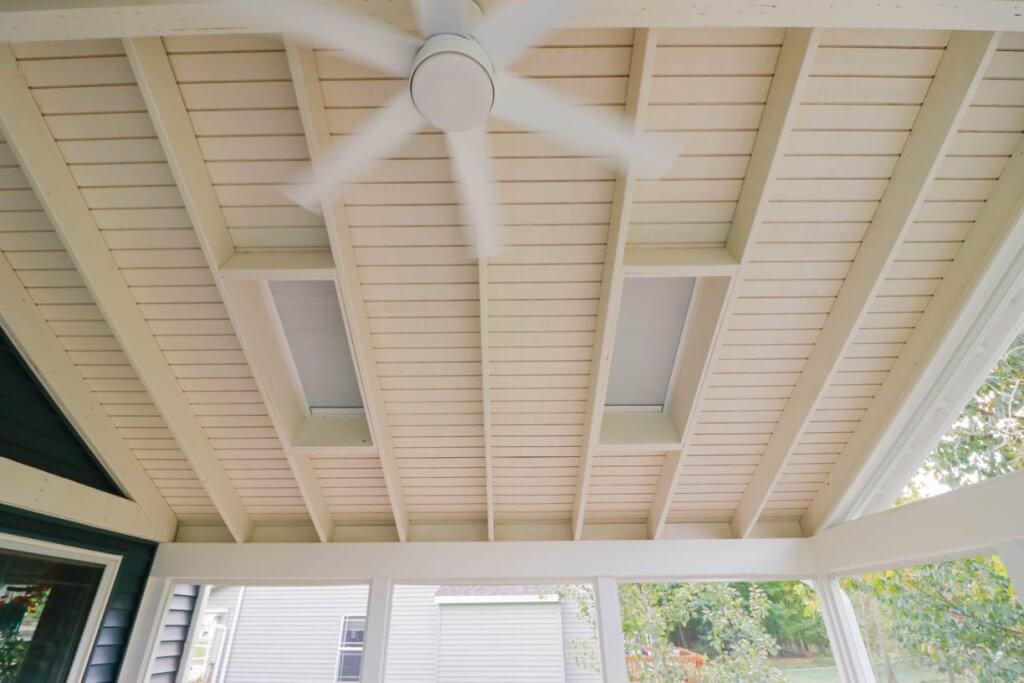 finished sunroom addition overlooking yard by Odd Fellows Contracting on Cataline Drive, MI