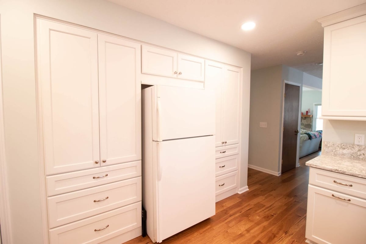 kitchen remodel featuring custom cabinetry around refrigerator by Odd Fellows Contracting in Onondaga, MI