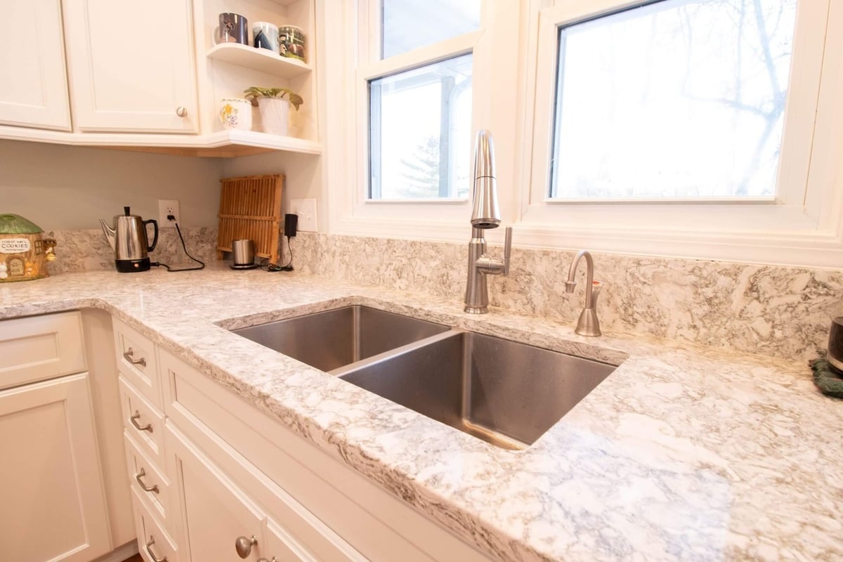 kitchen sink and countertop detail from kitchen remodel by Odd Fellows Contracting in Onondaga, MI