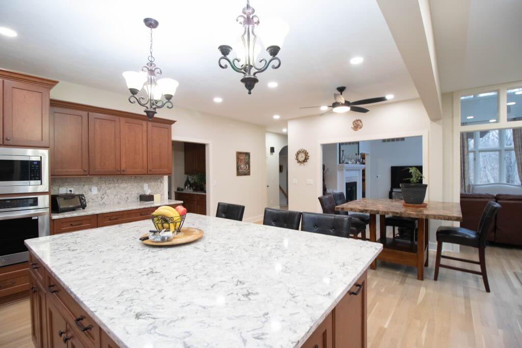 modern kitchen island centerpiece in remodel by Odd Fellows Contracting in Okemos, MI