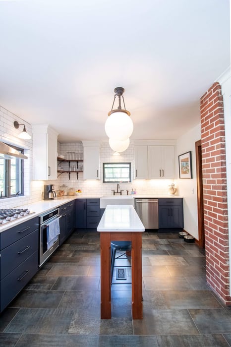 custom kitchen remodel featuring pendant lighting and center island by Odd Fellows Contracting in East Lansing MI