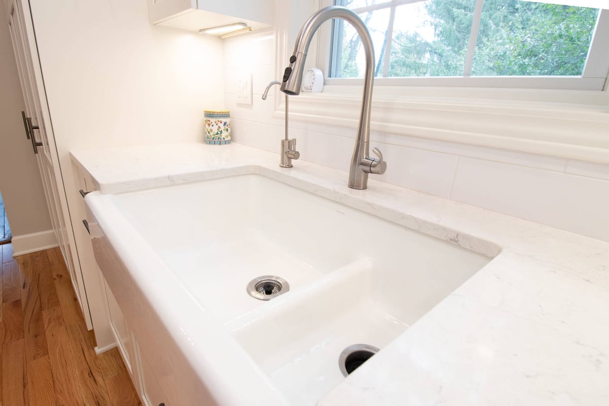 Mason MI kitchen remodel transformation by Odd Fellows Contracting showing improved storage and sink area
