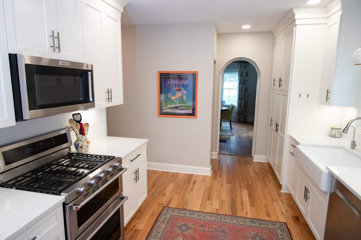 Mason MI kitchen renovation by Odd Fellows Contracting featuring bright cabinetry and modern finishes