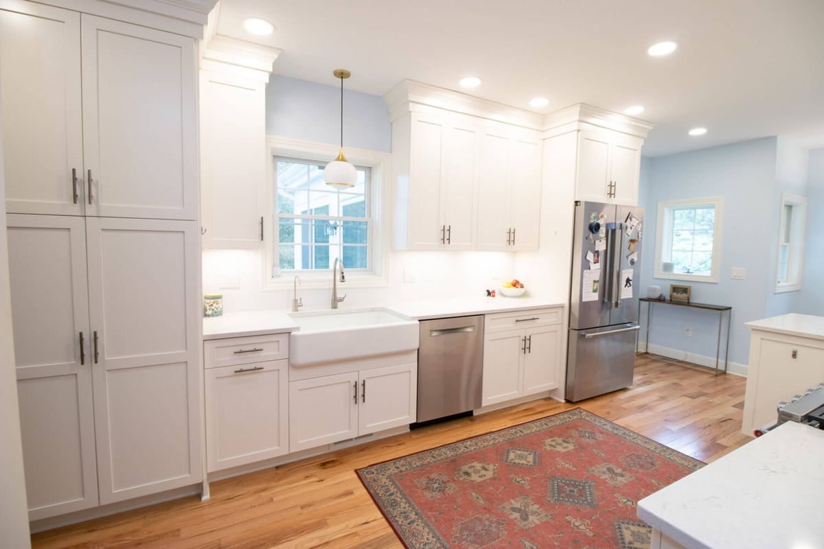 kitchen remodel by Odd Fellows Contracting in Mason MI showcasing custom cabinets and modern lighting