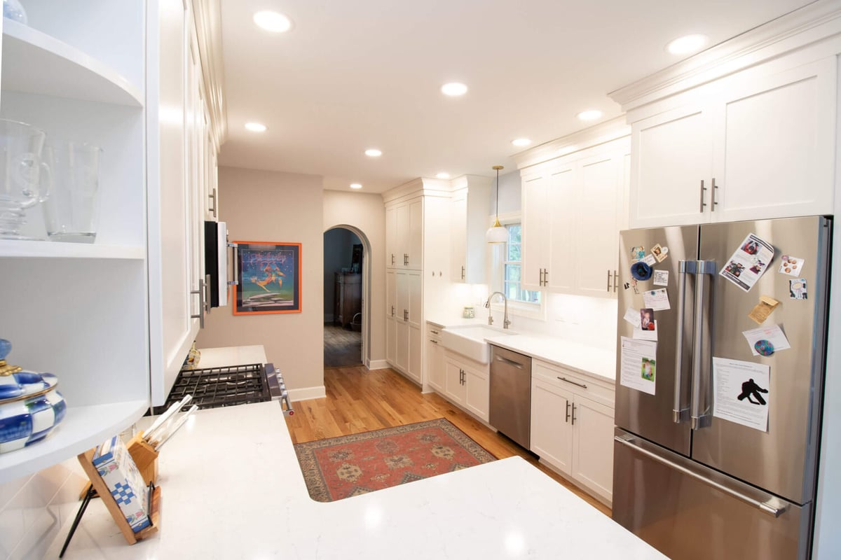 kitchen remodel by Odd Fellows Contracting in Mason MI with stainless appliances and white cabinets