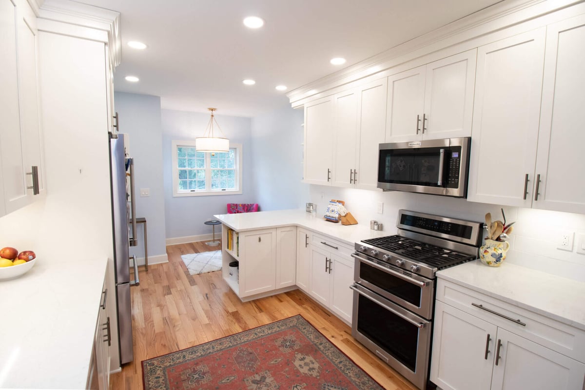 remodeled kitchen sink area by Odd Fellows Contracting in Mason MI with modern fixtures and finishes