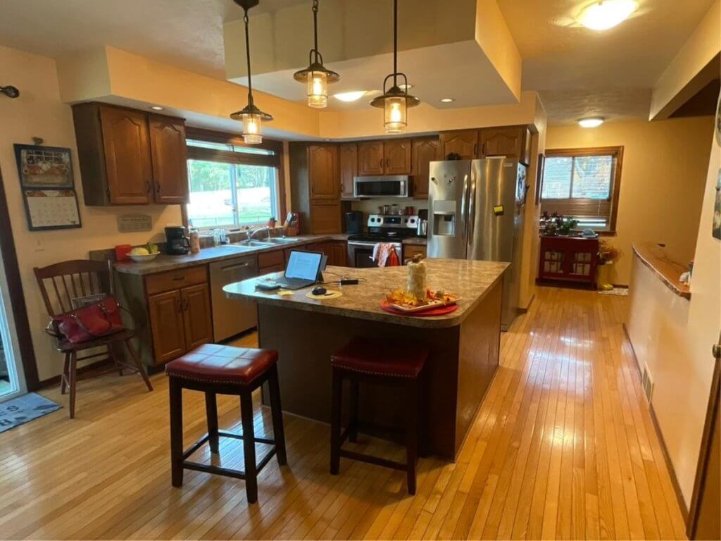 Existing kitchen layout before remodel by Odd Fellows Contracting in Williamston, MI with wood cabinets and laminate counters.