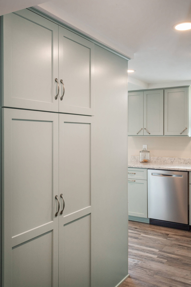 tall built-in kitchen cabinetry installed during a kitchen remodel by Odd Fellows Contracting in Eaton Rapids, MI