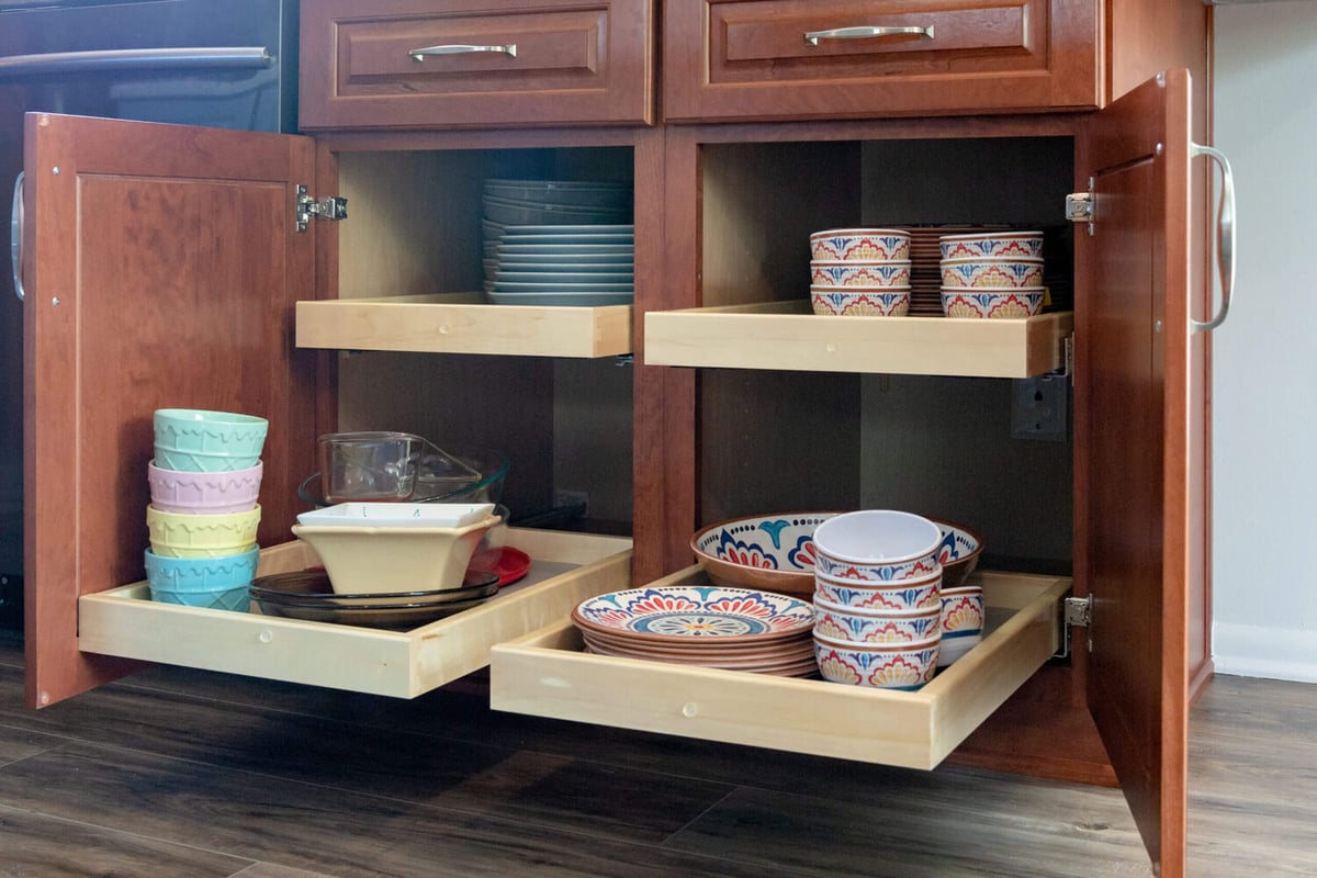 custom pull out kitchen cabinet storage drawers by Odd Fellows Contracting in Grand Ledge, MI remodel
