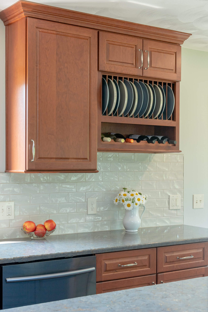 remodeled kitchen storage with plate display cabinet by Odd Fellows Contracting in Grand Ledge, MI