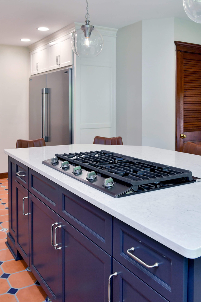 kitchen remodel island with built in gas cooktop by Odd Fellows Contracting in Okemos, MI