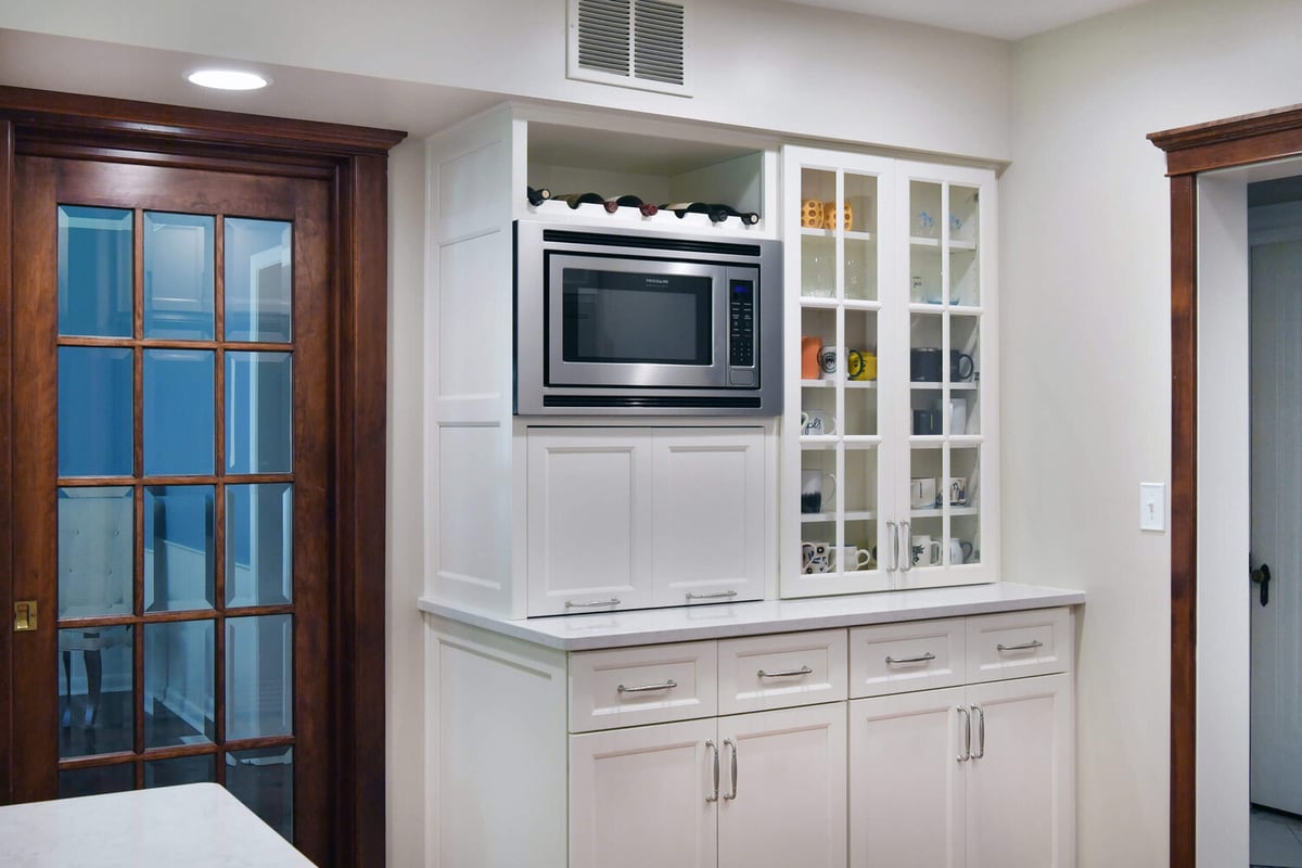 kitchen renovation with built in microwave and storage cabinetry by Odd Fellows Contracting in Okemos, MI