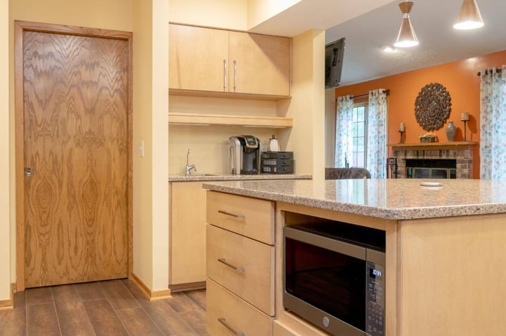 Custom kitchen coffee bar and microwave station in East Lansing Michigan kitchen remodel by Odd Fellows Contracting
